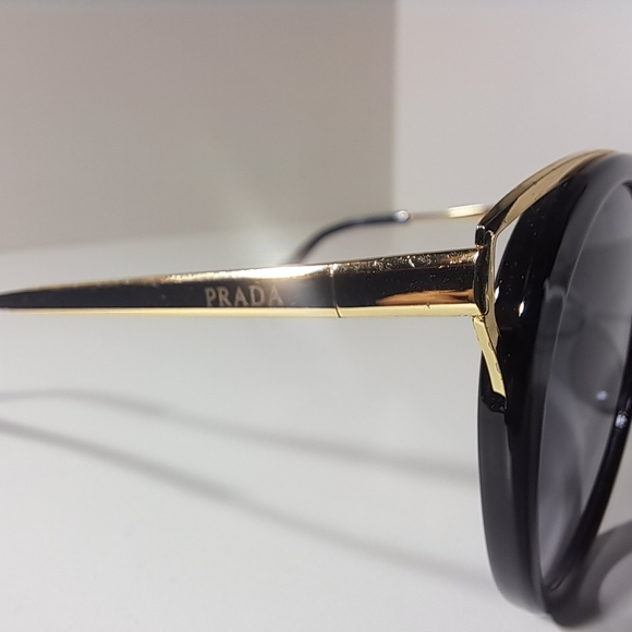 Prada Black Frame Sunglasses with Gold Temple Accents - Picture 3 of 12
